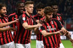 开云下载-安德烈·沙维连斩两球，米兰进四强的简单介绍